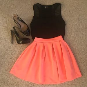 Neon orange scuba mini skirt
